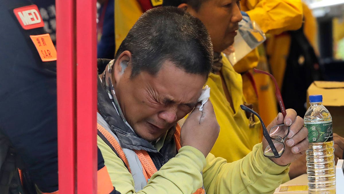 Liu Zhong-da, a worker of Taroko National Park gets a physical examination after being rescued in Hualien County, eastern Taiwan