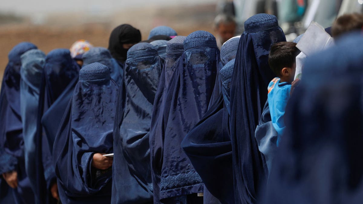 Displaced Afghan women guidelines waiting to person rate aid