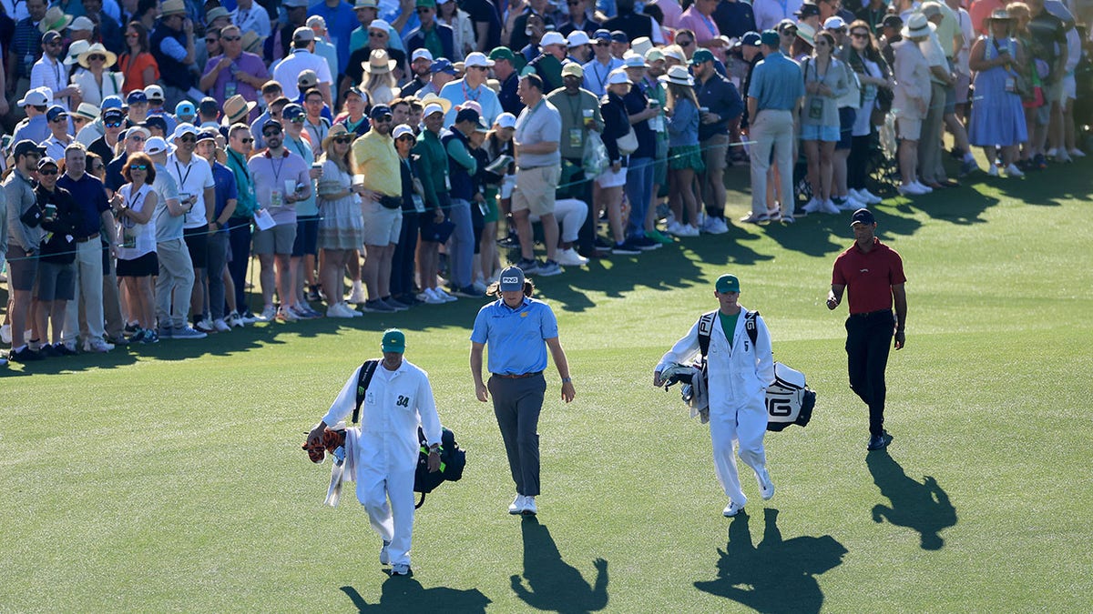 Tiger Woods and Neal Shipley