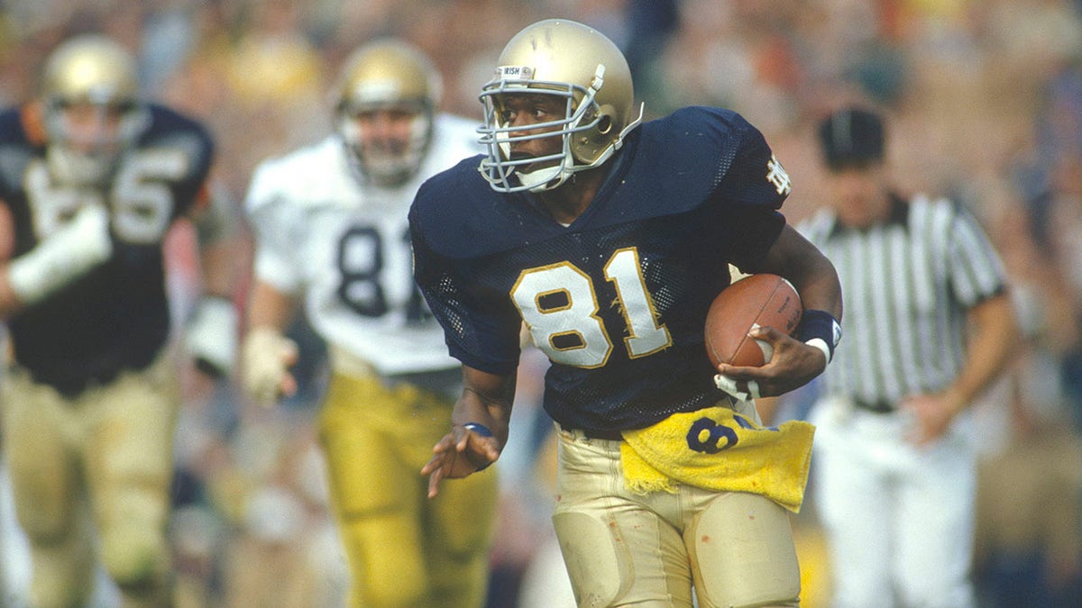 Tim Brown with Notre Dame