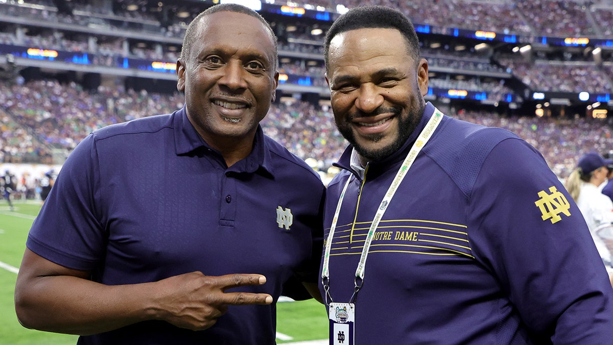 Tim Brown and Jerome Bettis