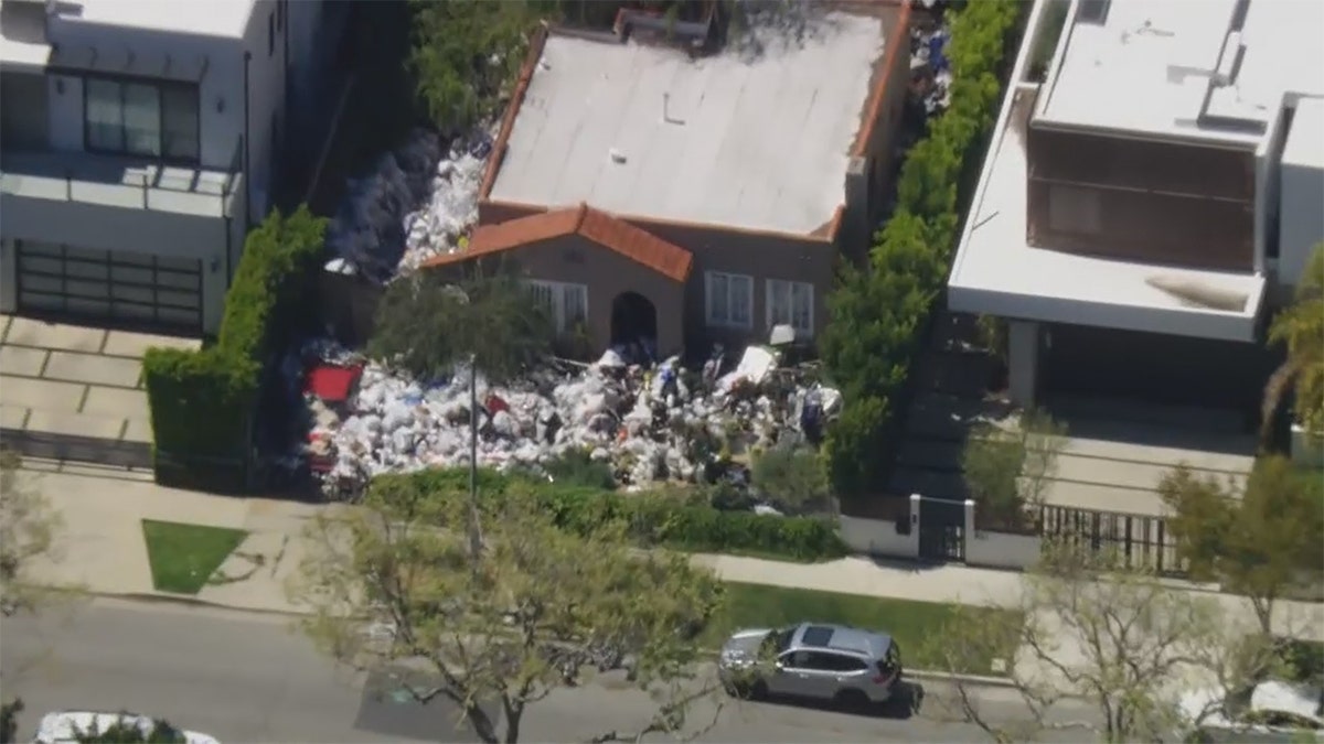 Trash outside LA home has gotten worse