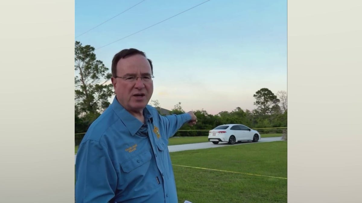 Polk County Sheriff Grady Judd near where the murder happened