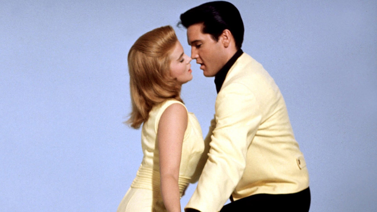 Ann-Margaret and Elvis Presley in yellow outfits