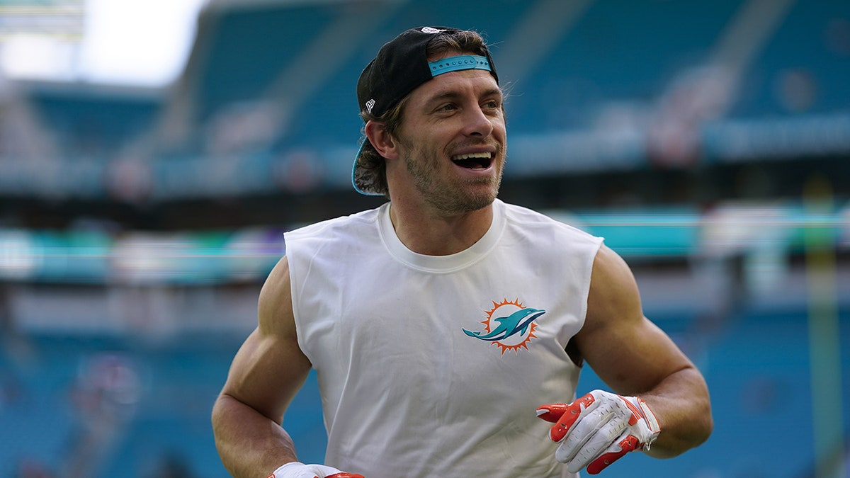 Braxton Berrios warms up