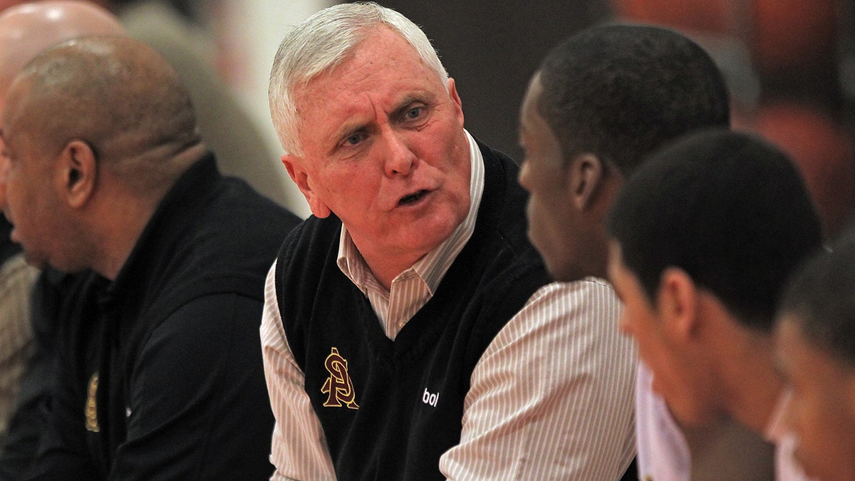 Bob Hurley Sr. talks to team