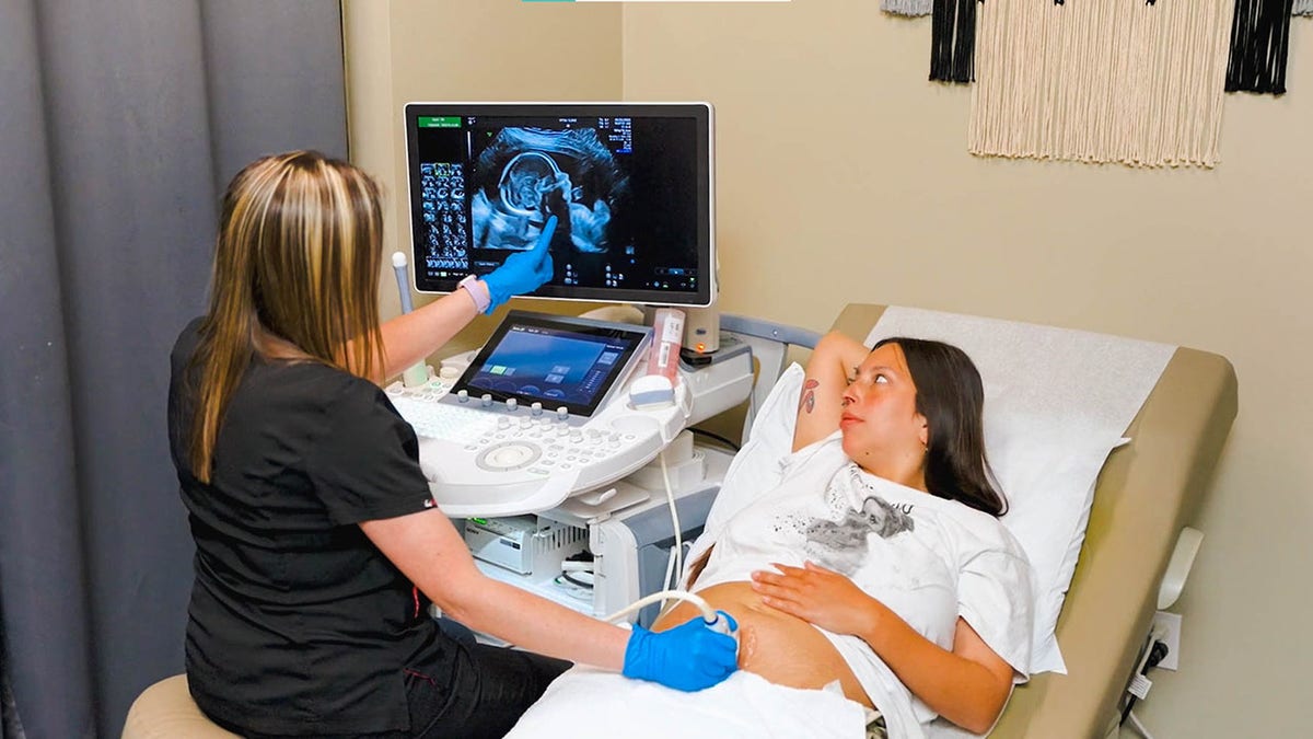 woman getting sonogram