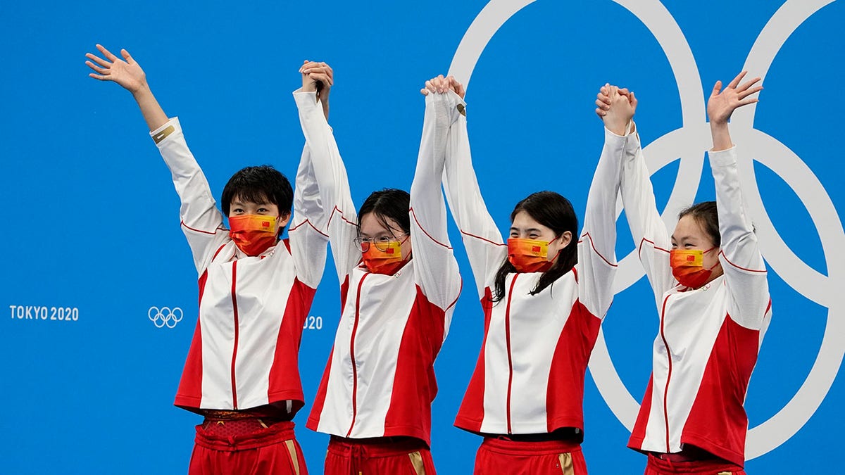 China swim team after winning medal