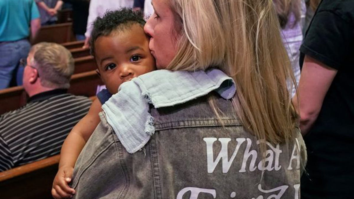 woman holding child