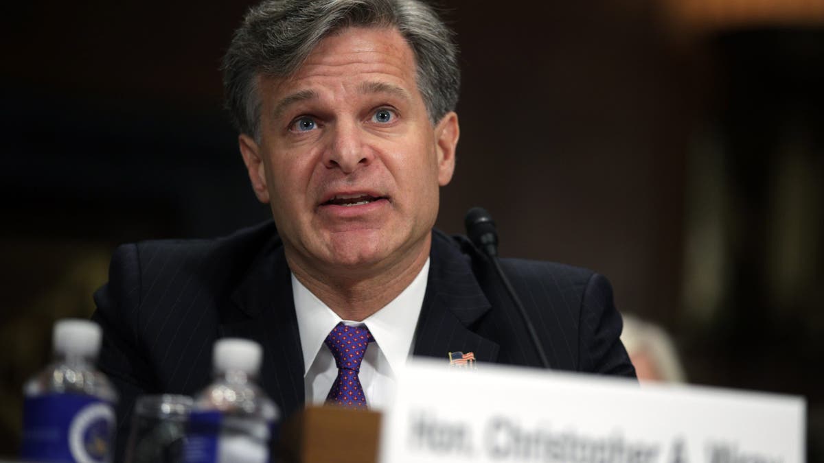 Christopher Wray speaking