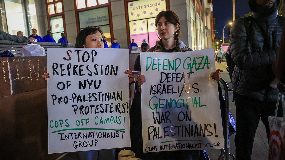 NYU protesters with signs