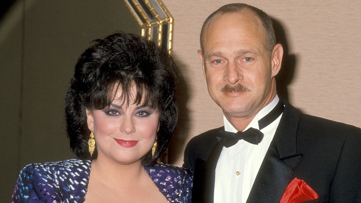 Actress Delta Burke poses alongside husband Gerald McRaney