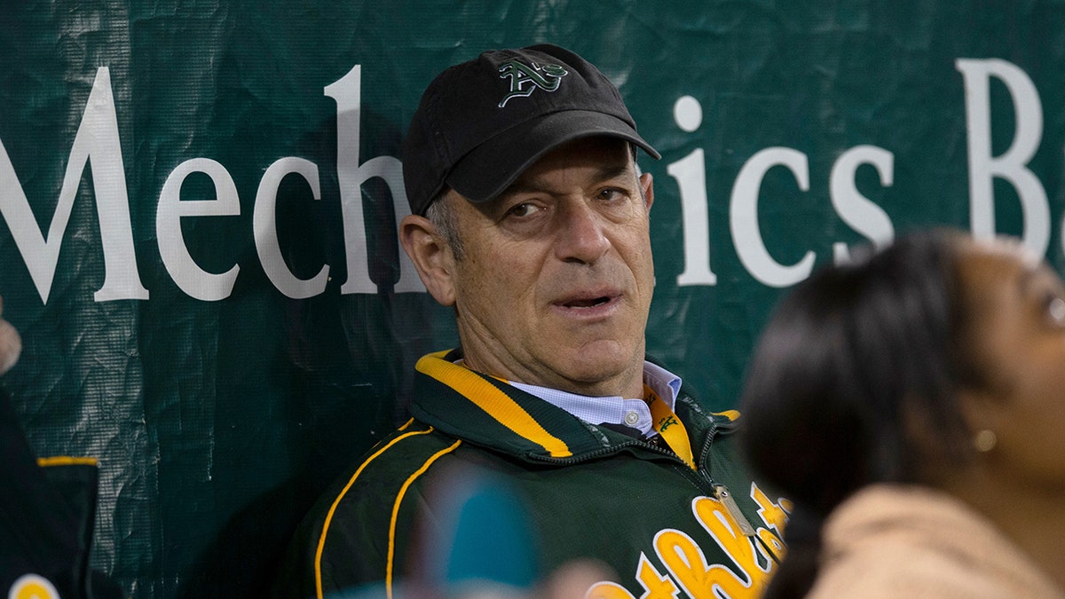 Oakland owner John Fisher in the dugout