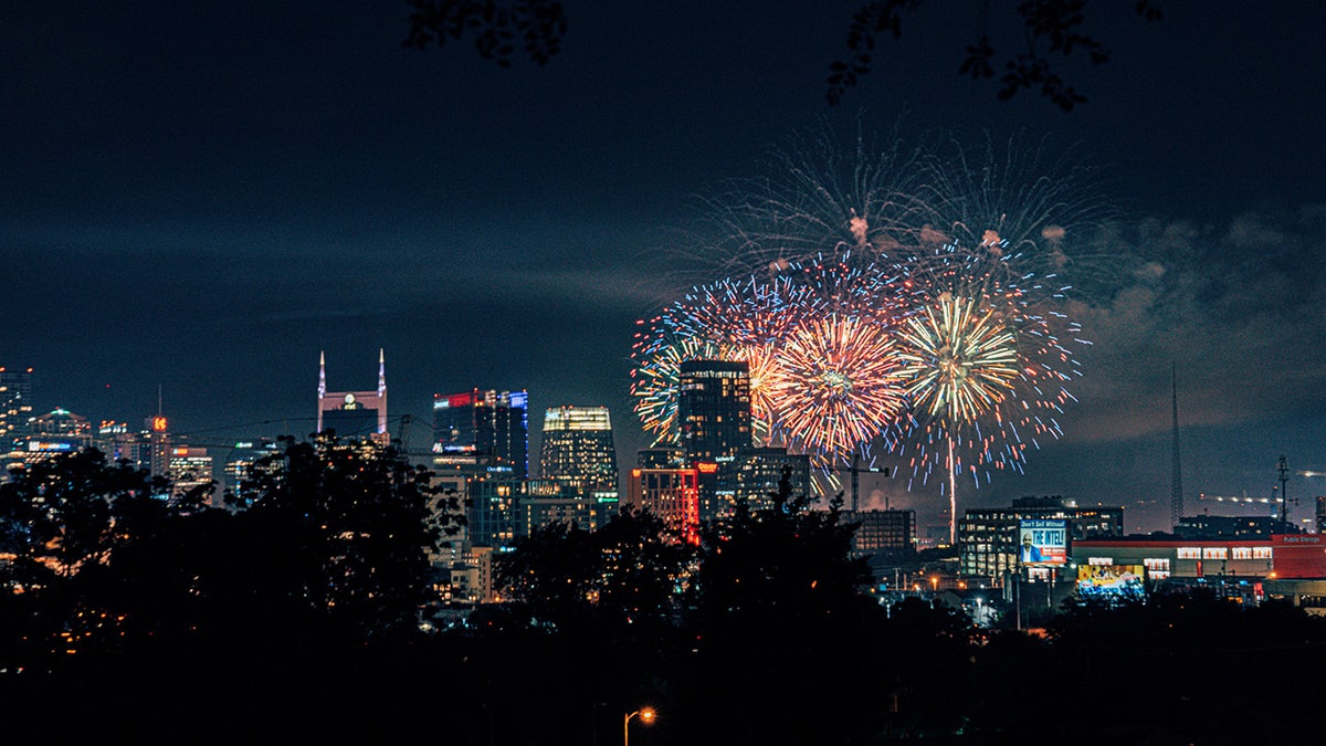 For a country music festival paired with fireworks, visit Nashville.