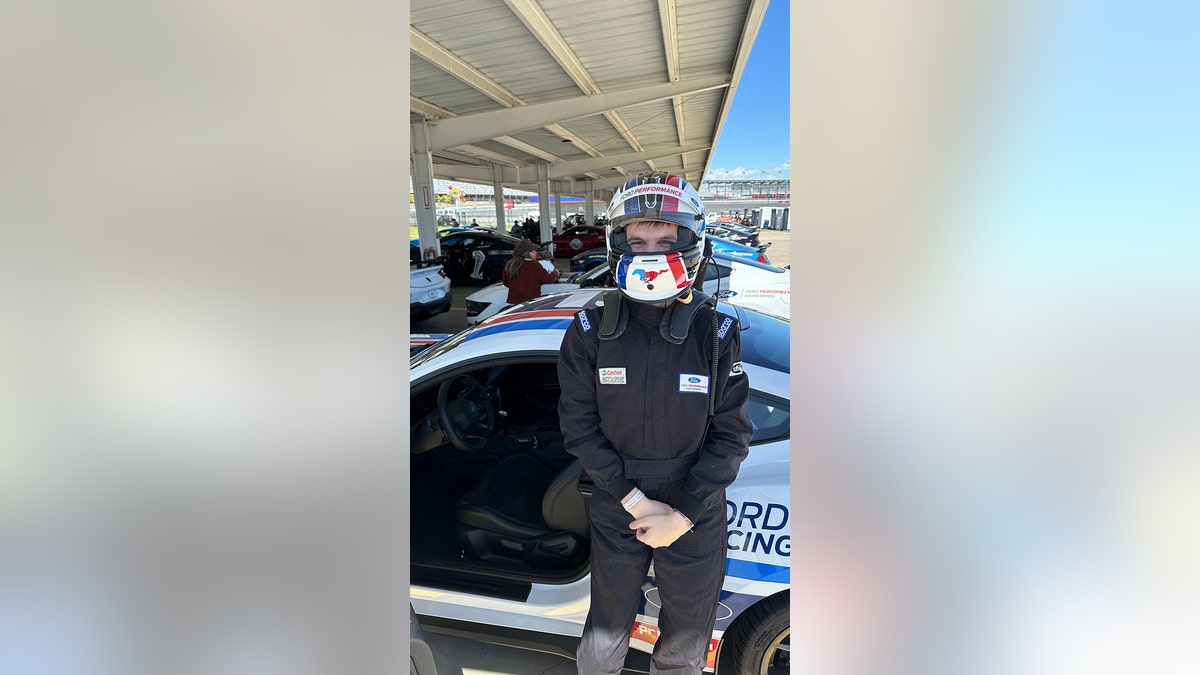 Joseph and the Mustang on the race track