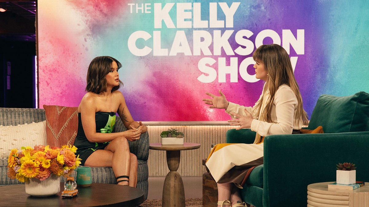 Maren Morris sits and speaks with Kelly Clarkson on her daytime talk show