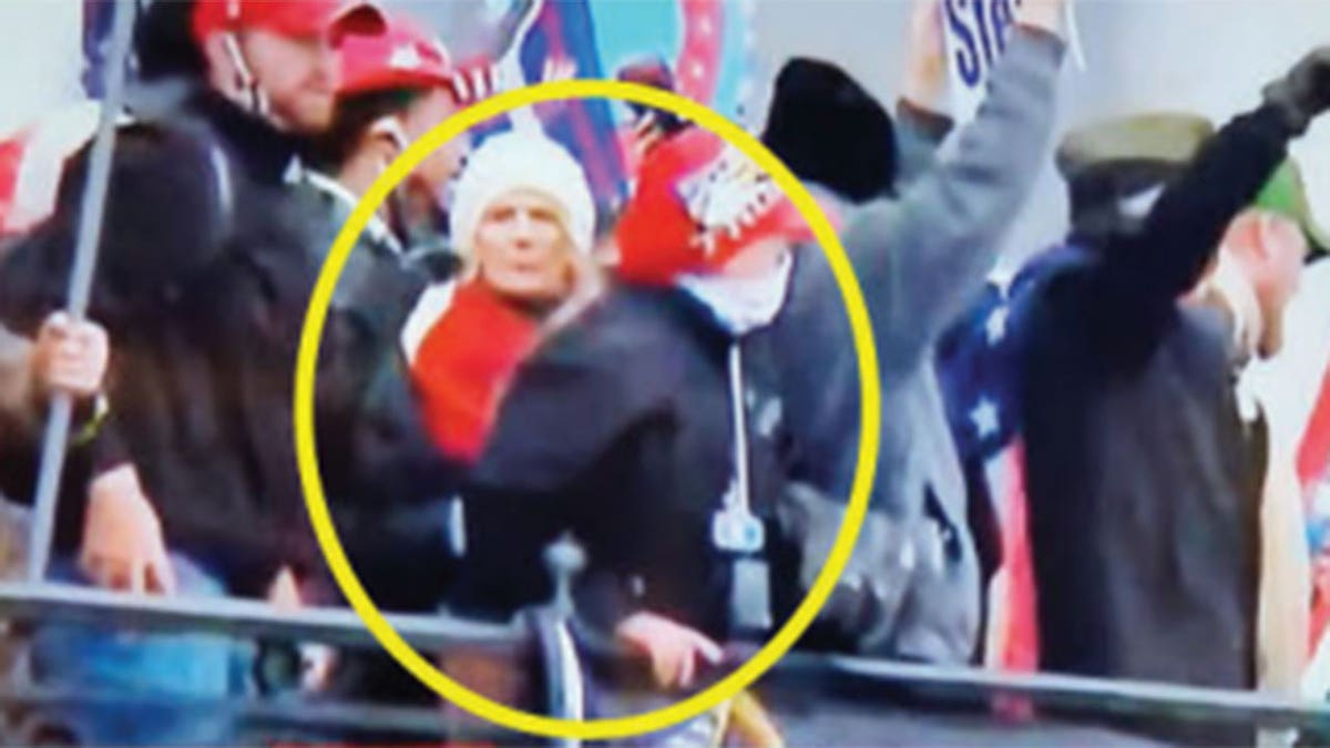 Rebecca Lavrenz seen in live news coverage of the Capitol riot