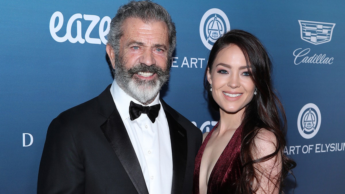 Mel Gibson and Rosalind Ross on the red carpet