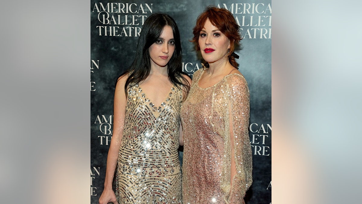 Mathilda Gianopoulos and her mother Molly Ringwald both in sparkly outfits on the carpet in New York