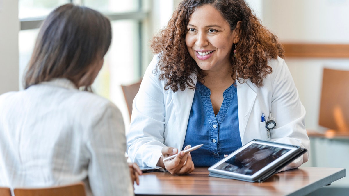 Neurologist and patient