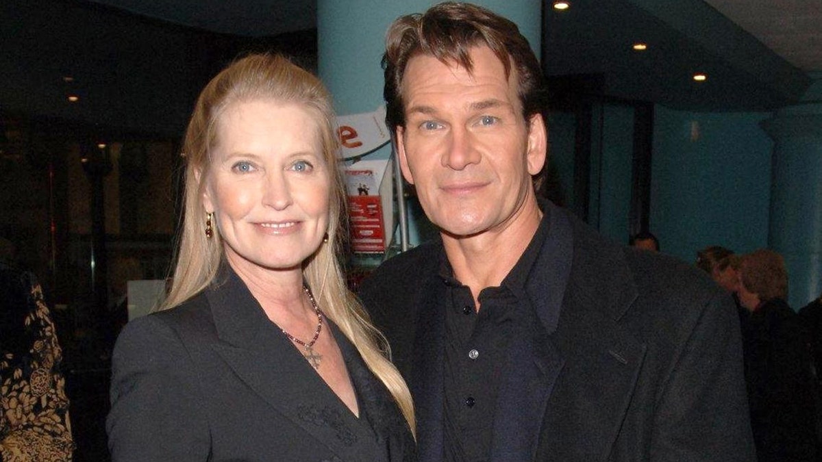 Patrick Swayze and his wife Lisa Niemi dressed in black