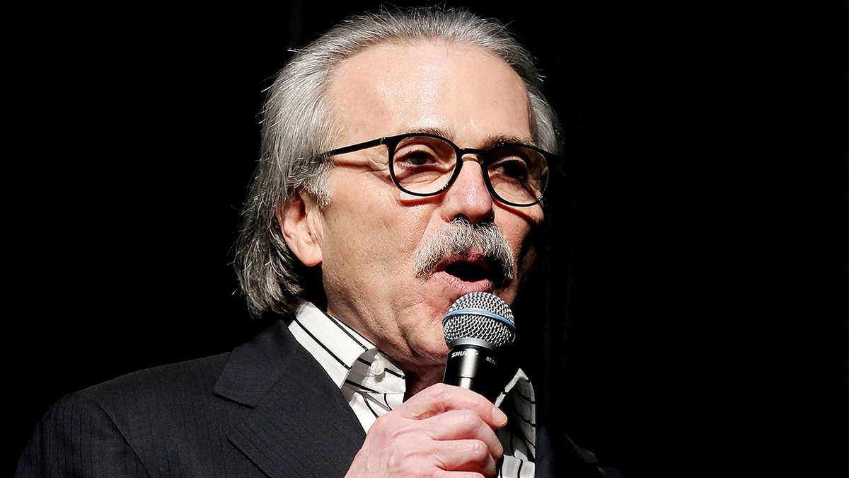 David Pecker speaking successful  microphone