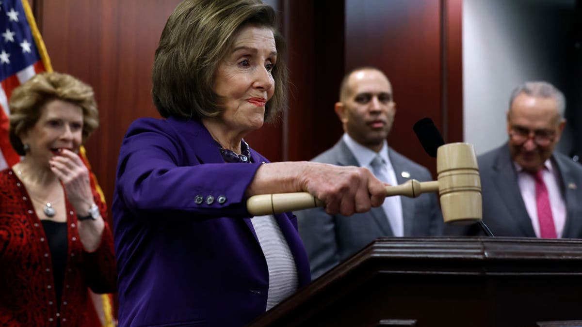 Nancy Pelosi bangs gavel