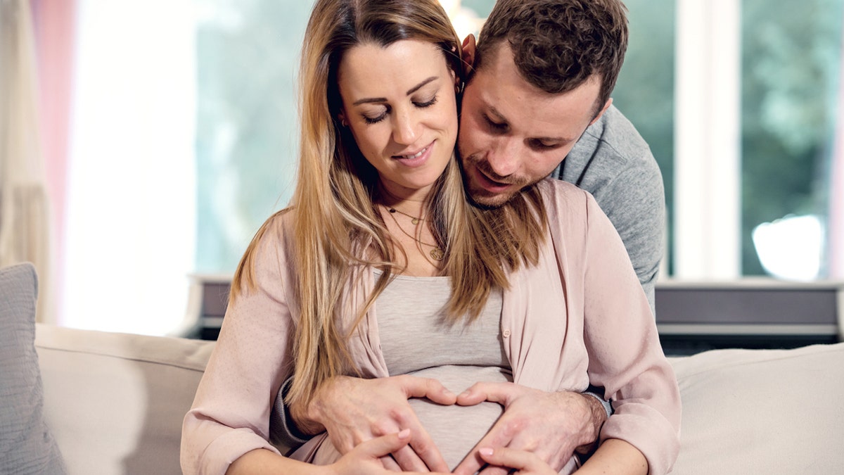 Pregnant woman with husband