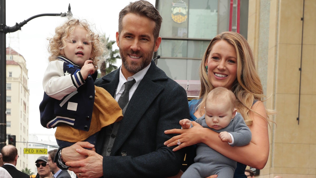 Blake Lively and Ryan Reynolds with their kids on Hollywood Walk of Fame.