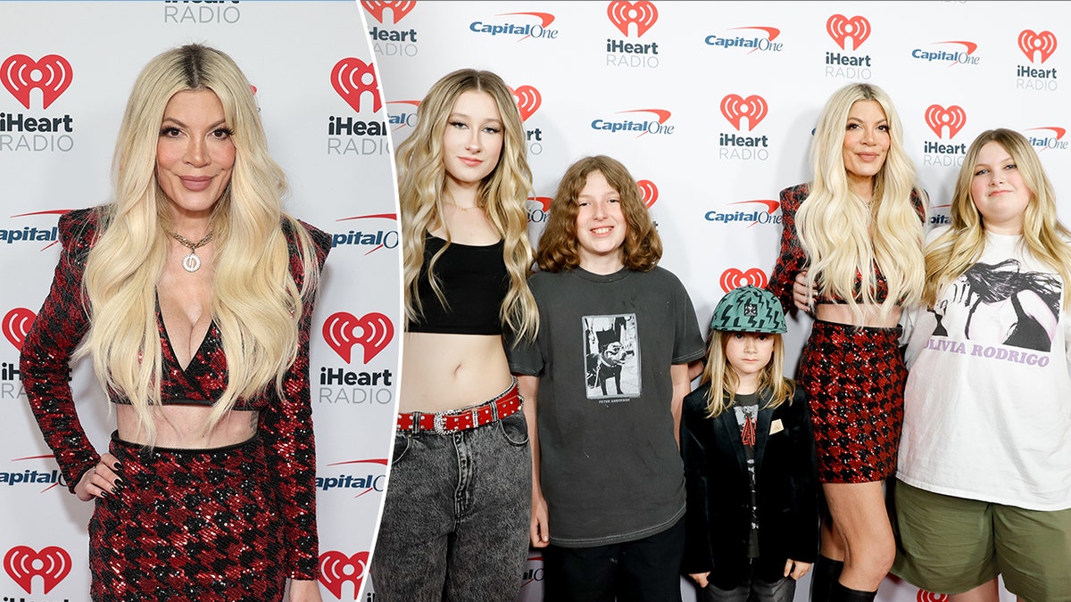 Tori Spelling in a red and black checkered two piece on the carpet split appears with four of her five children on the carpet