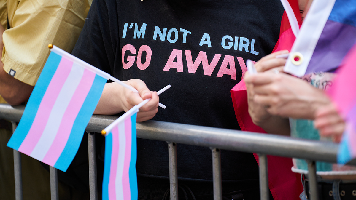 A person displays trans pride flags during the NYC Pride March in New York, US, on Sunday, June 25, 2023. New York City's annual Pride March commemorates the 1969 uprising by members of the LGBTQ community at the Stonewall Inn in Greenwich Village. Photographer: Bing Guan/Bloomberg via Getty Images