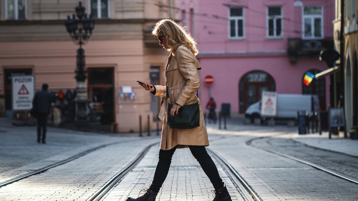 Woman walking on phone