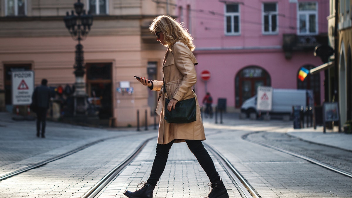 Woman walking on phone