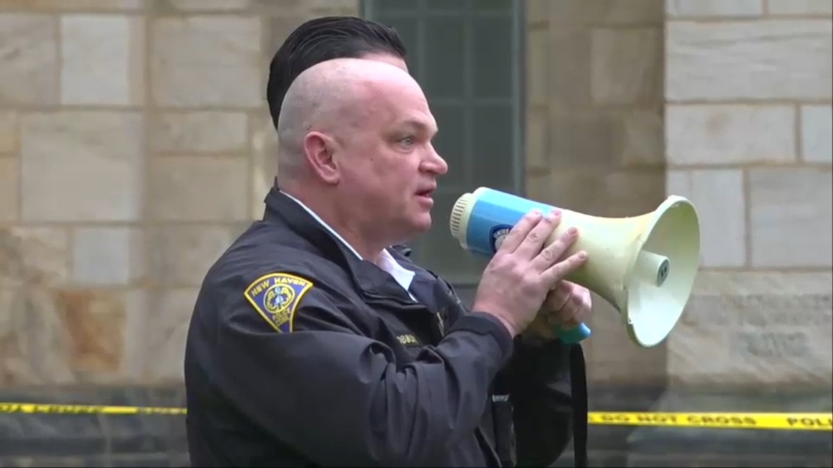 New Haven Police Chief Karl Jacobson with megaphone