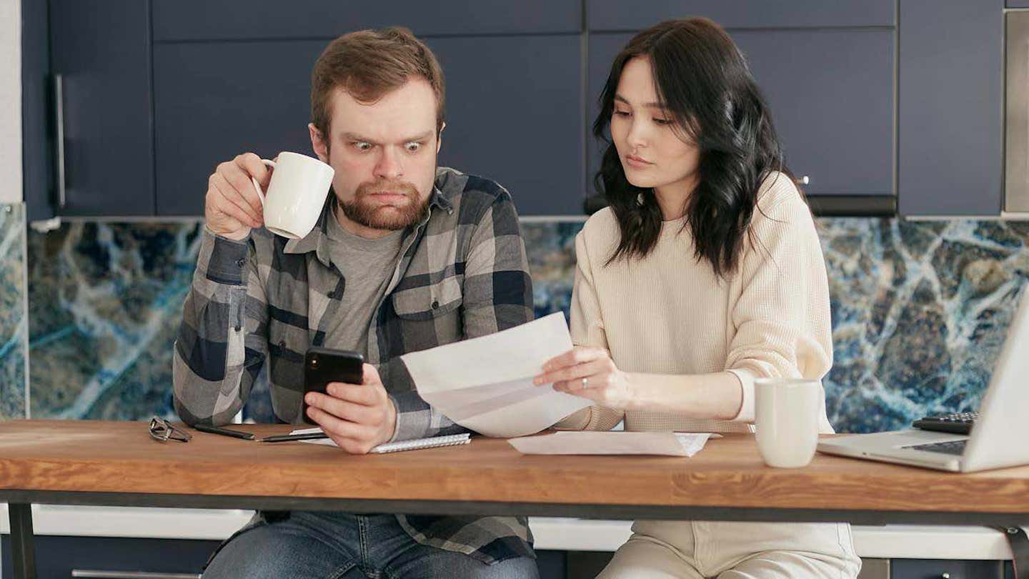3 Advice from a reader who files debit card fraud claims all day Man sitting with woman looking aghast while holding coffee