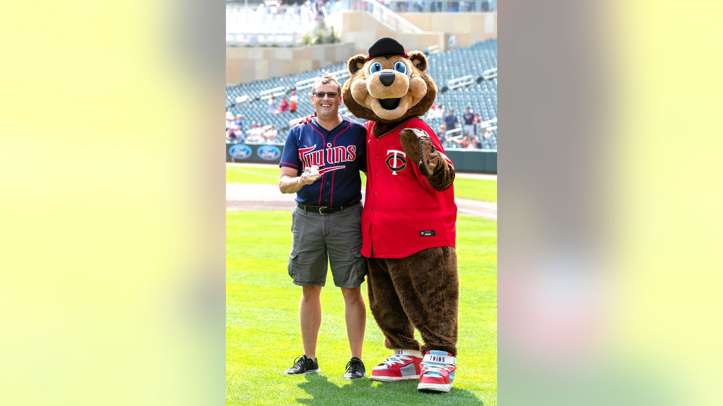 Kelm with Minnesota Twins TC Bear First Pitch Parkinsons Awareness Day