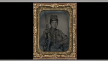 Sergeant William T. Biedler, 16 years old, of Company C, Mosby's Virginia Cavalry Regiment with flintlock musket.