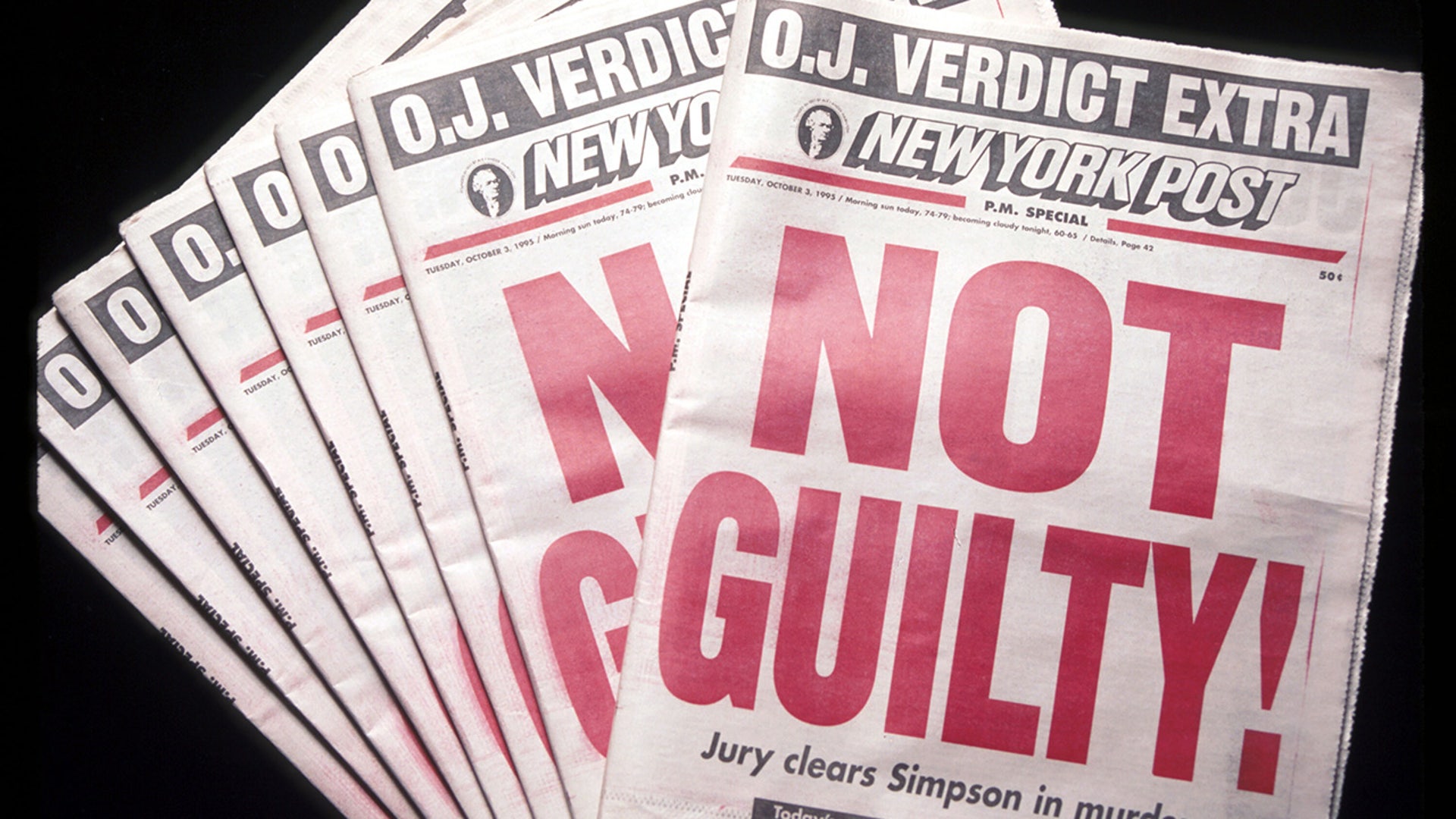 The New York Post displays a "Not Guilty!" headline regarding OJ Simpson