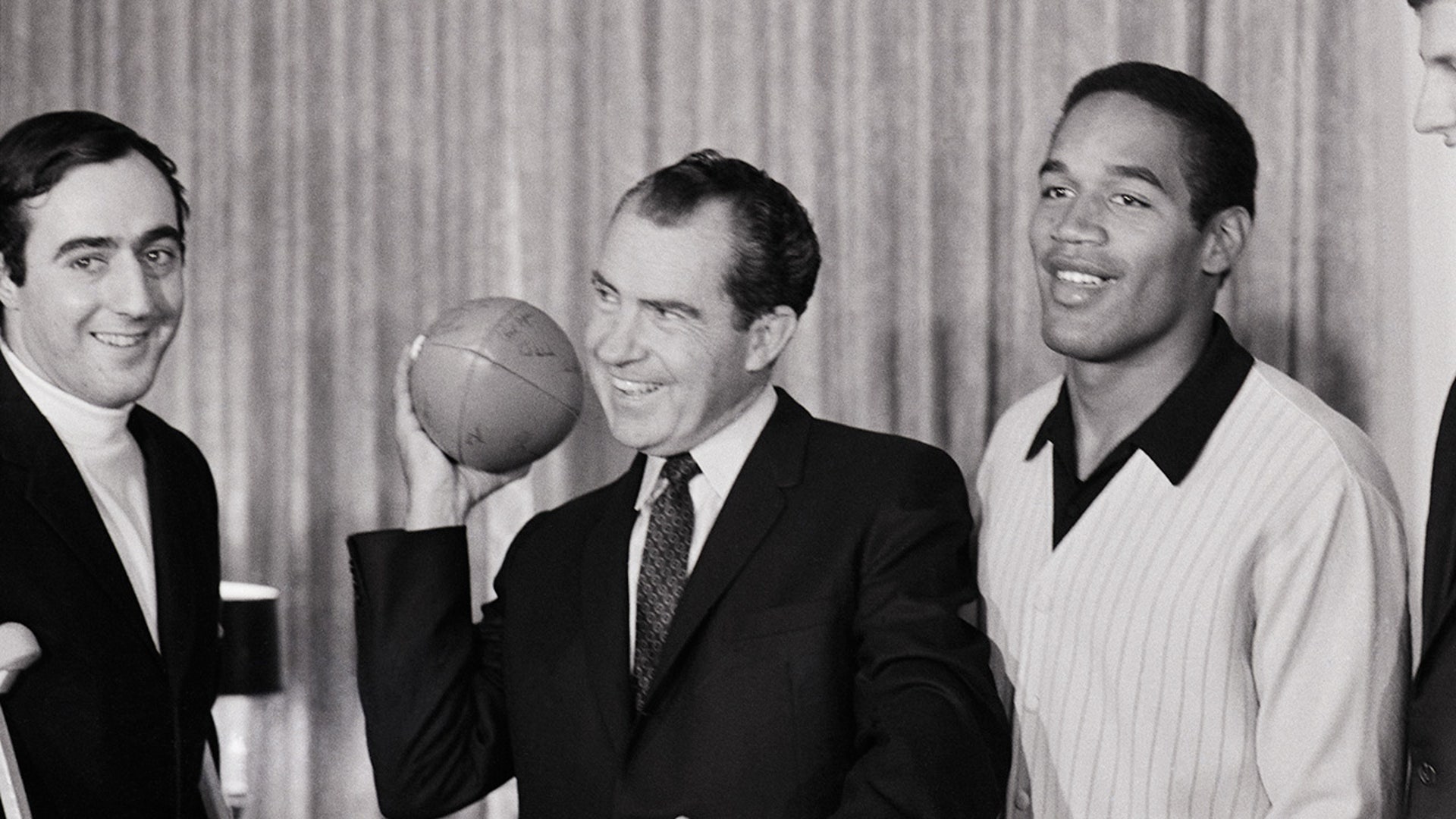 Richard Nixon poses with OJ Simpson