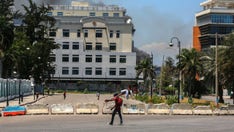 Haitian gangs loot national library amid spiraling violence that has forced thousands to flee capital city