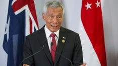 Singapore PM to step down after 2 decades, handing power to his deputy