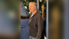 Alec Baldwin smacks phone of anti-Israel agitator who begged him to say 'Free Palestine' inside coffee shop