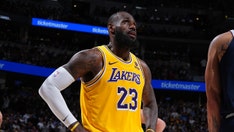 LeBron James makes heckling fan flinch after giving her jump scare