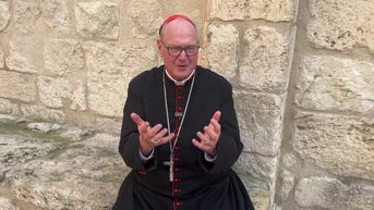 Cardinal Dolan describes moment he took shelter during missile attack