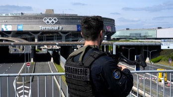 Massive policing for Paris Olympics to include security checks for some of the capital's residents