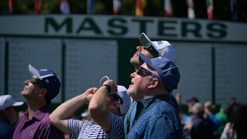 Solar eclipse takes over the Masters as golfers and fans alike soak it in