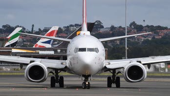 'Drunk' airplane passenger fined for reportedly urinating in cup during delay at Australia airport