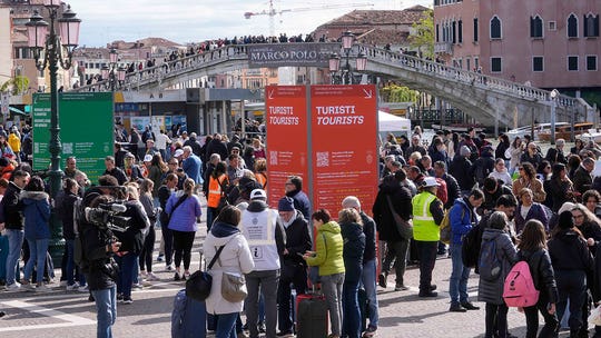 Venice begins charging entry fee for day-trippers to address tourism crisis