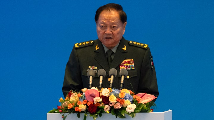 Chinese military leader takes harsh line on Taiwan