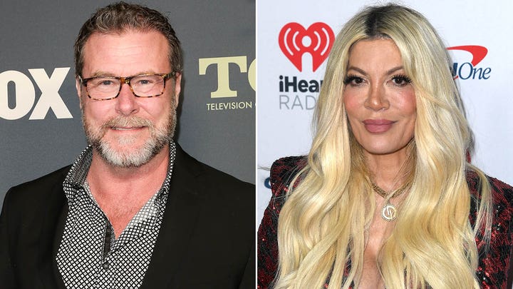 Tori Spelling walks the red carpet at the 2024 iHeartRadio Music Awards